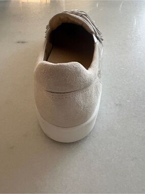 Women’s Suede Fringe Slip-On Sneakers in Beige